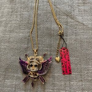 Edgy Skull Pendant Necklace with Purple Accents